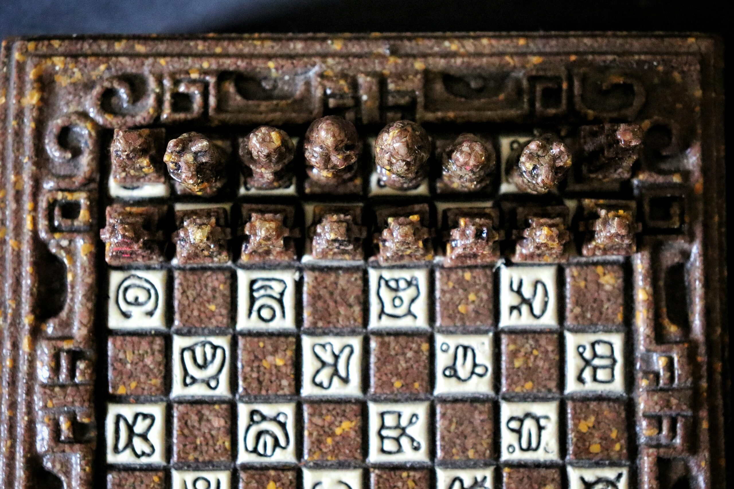 A close up of a metal grate with writing on it