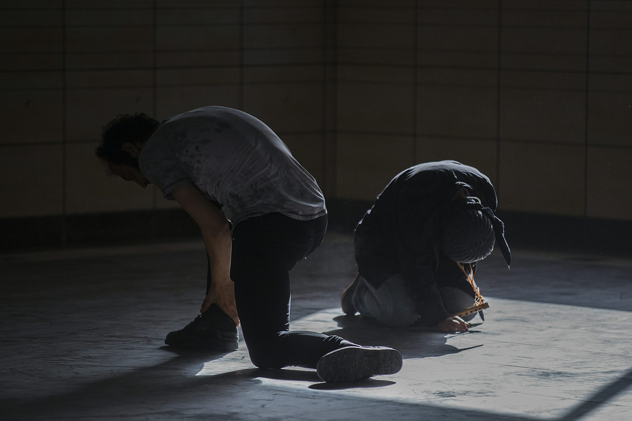 man holding his angkle