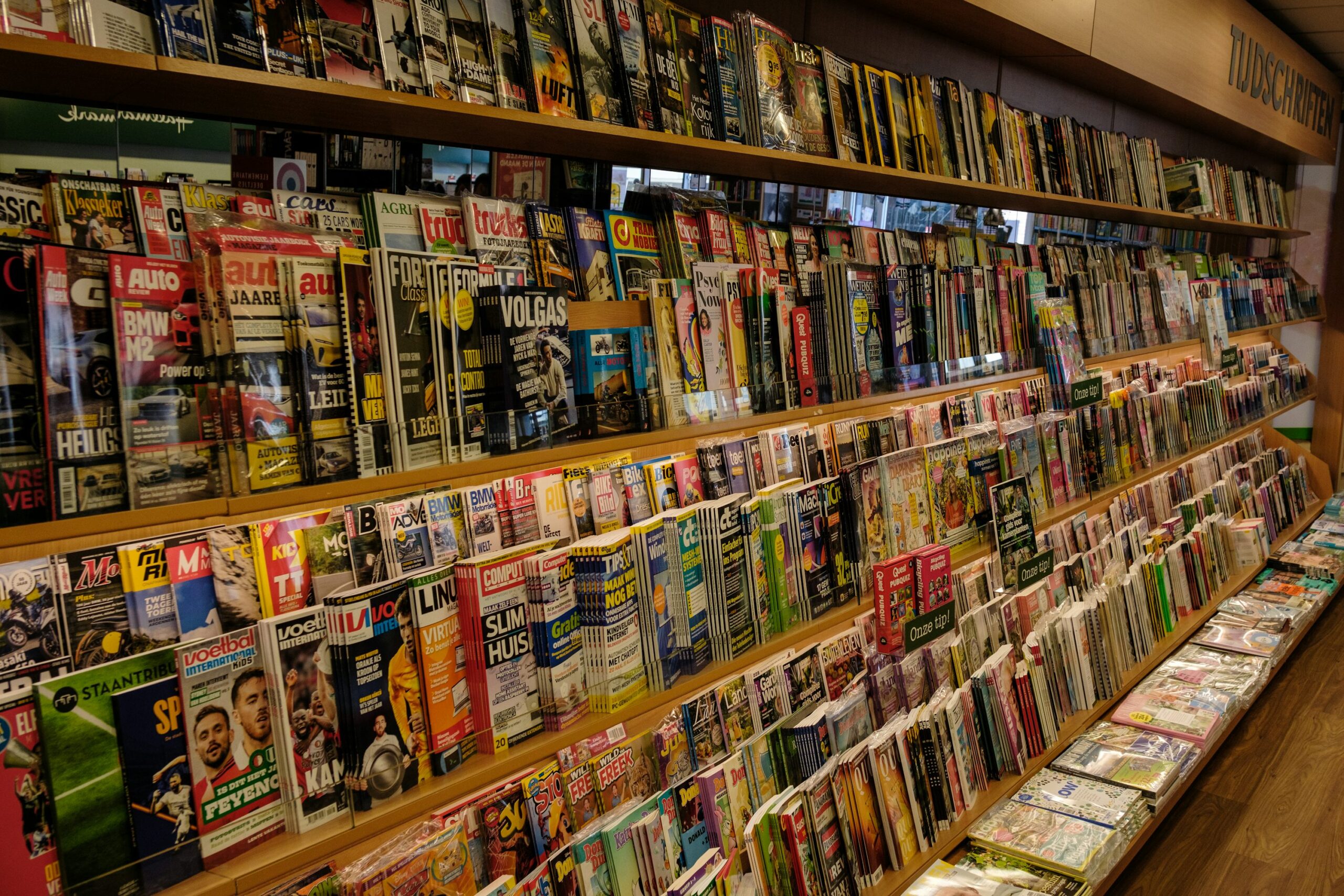 a large number of magazines are on display